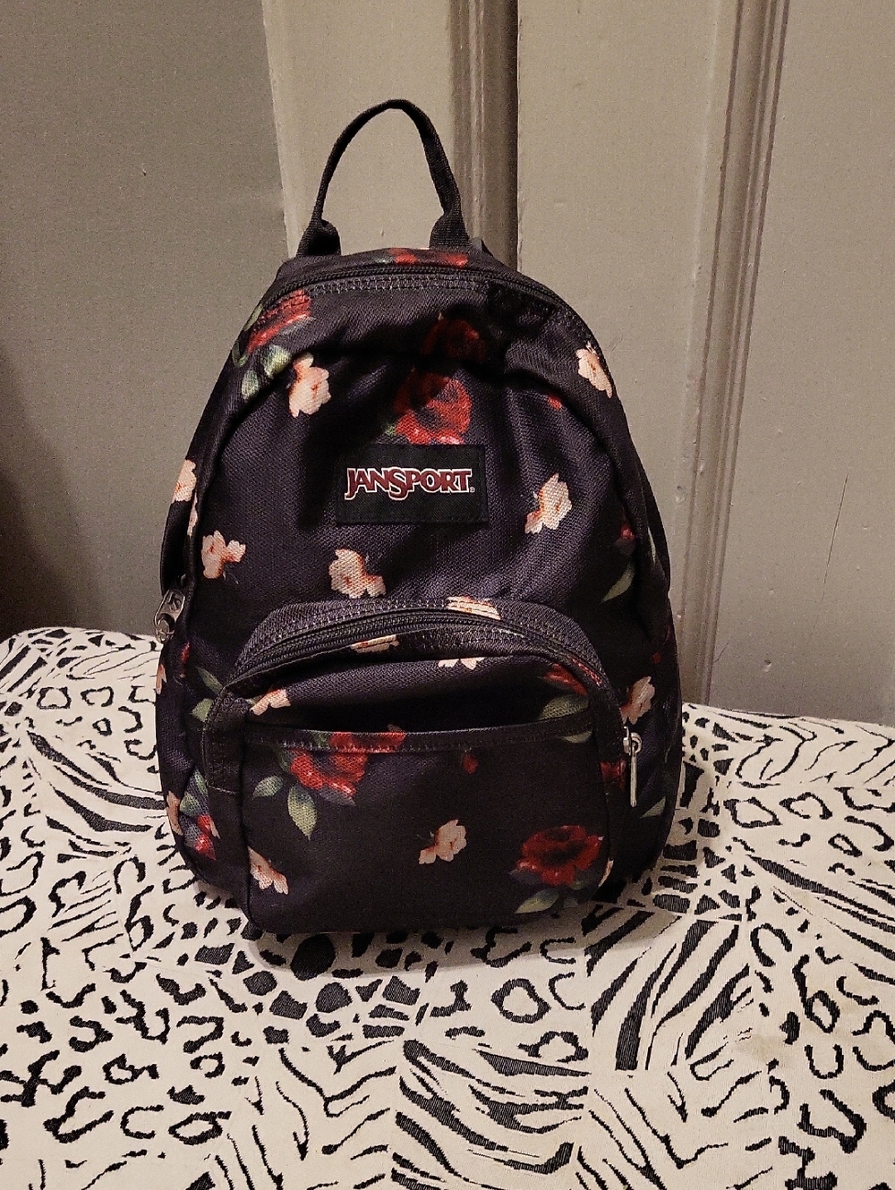 Jansport Black Mini Backpack with Red & Pink Floral Accents